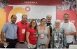 Célia Chaves e outros palestrantes com o presidente da Fecosul, Guiomar Vidor (D)